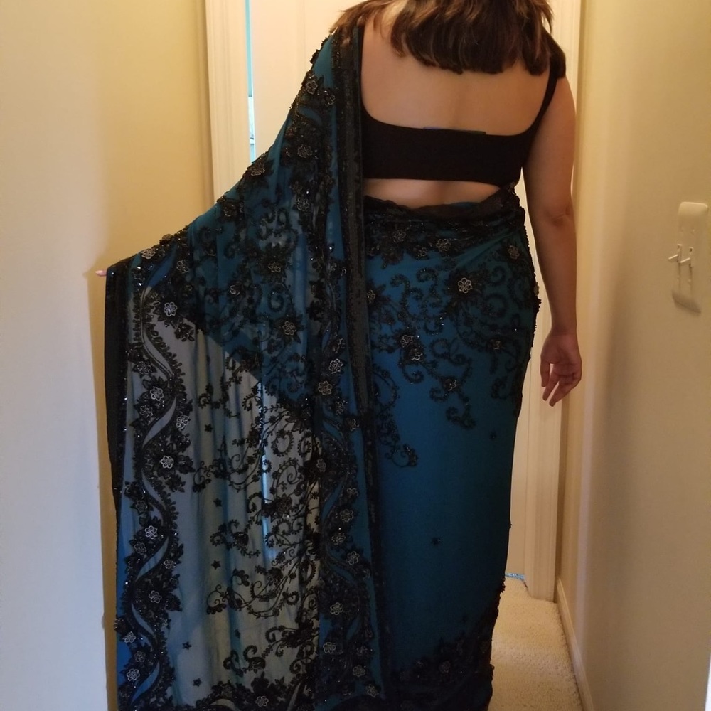 Indian Pakistani Deep teal heavily embellished, modern cocktail/reception saree.